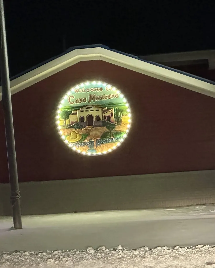 Illuminated commercial signage at night